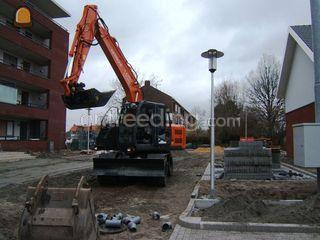 Hitachi ZX 140W Omgeving Gouda