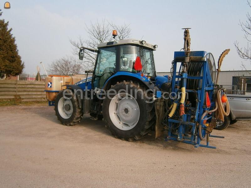 Trekker met drainage doorspuitmachine