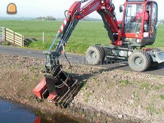 kraan + zaaimachine Omgeving Rotterdam