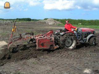 Trekker met kettinggraver Omgeving Rotterdam