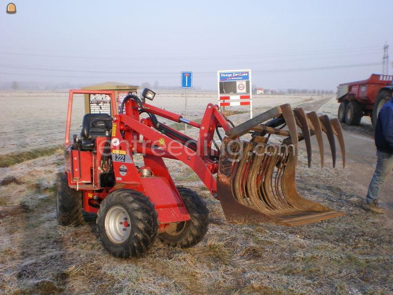 Minishovel met mestklem.