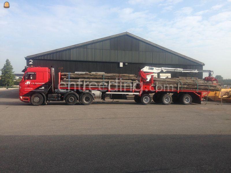 Scania 143 6x2 met stenen/platentrailer