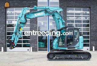 Kobelco SK140SR met stelg... Omgeving De IJsselsteden