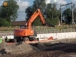Hitachi zx 140/draaikante... Omgeving Kamerik