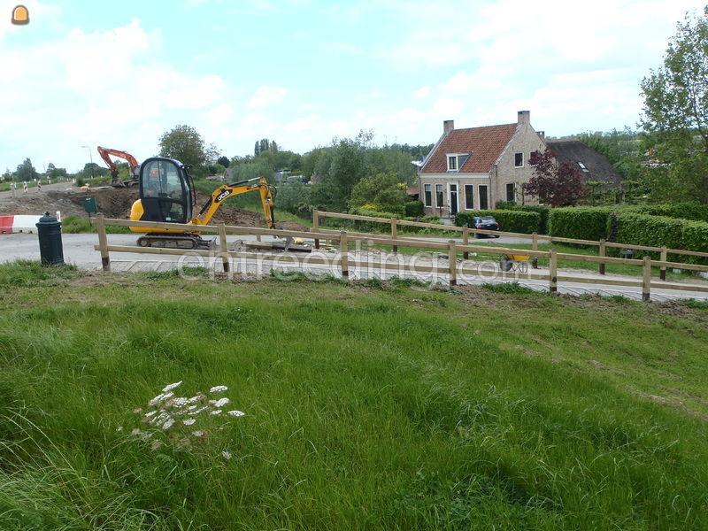 CAT minigraver met vervoer