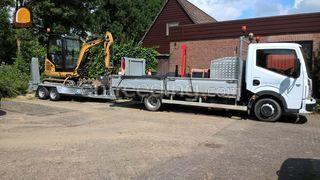 CAT minigraver met vervoer