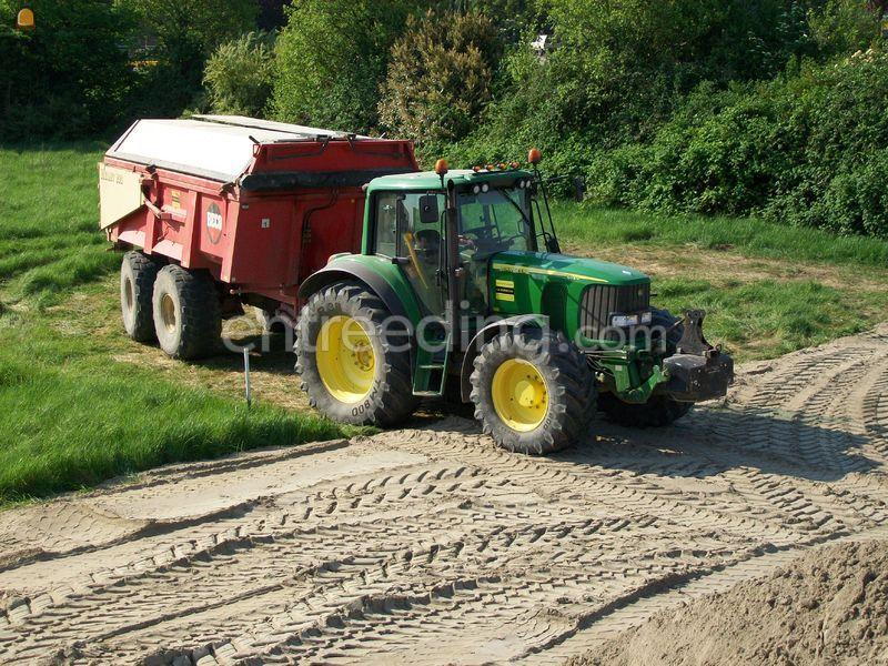 John deere 6920 of steyer Beco 200