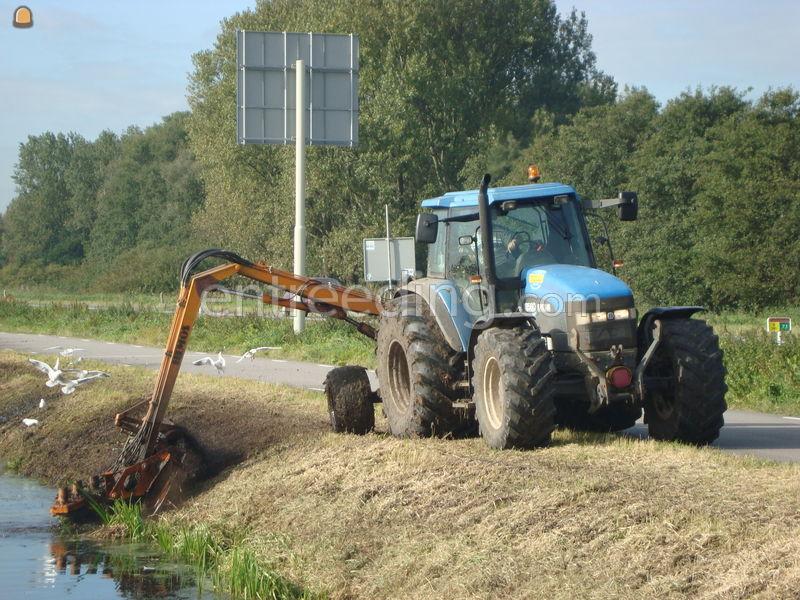 New holland tm120 + hemos slootapparaat