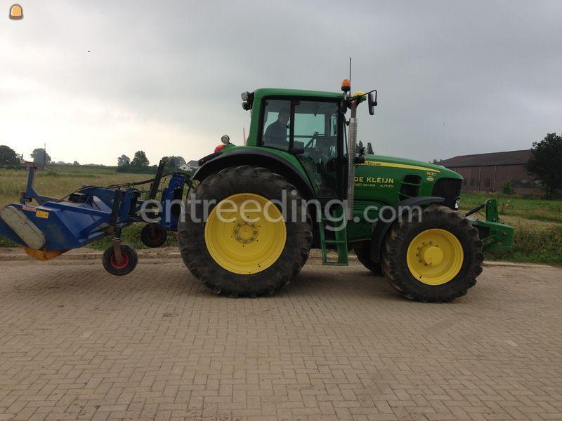 Tractor + veegmachine