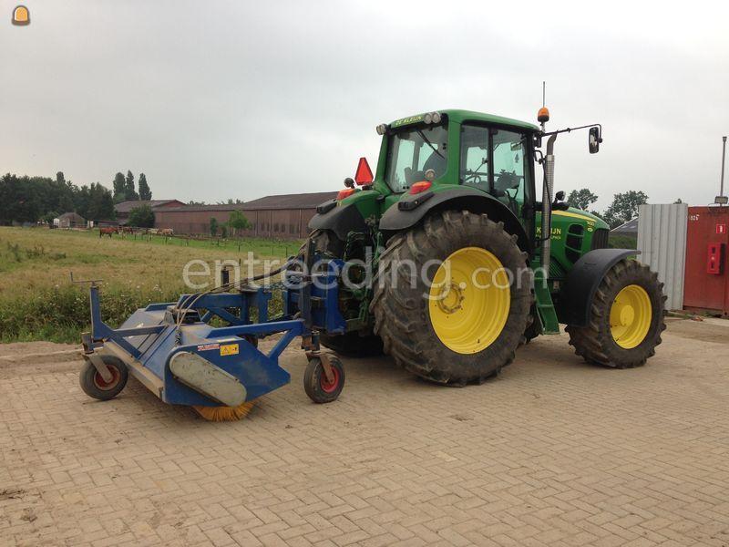 Tractor + veegmachine