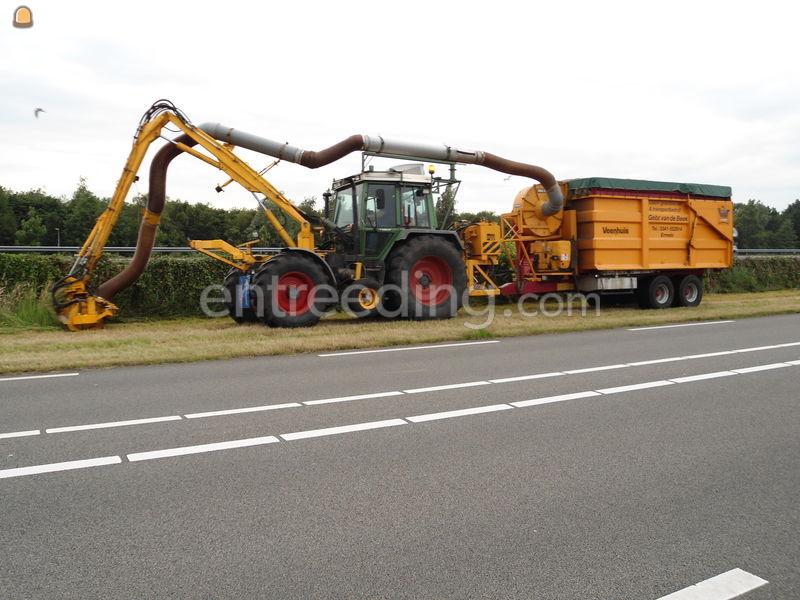 Trekker met maai/zuigcombinatie