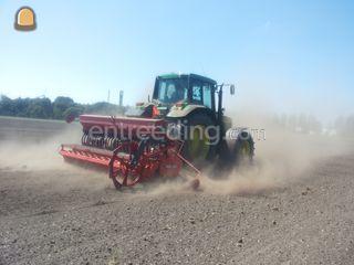 John Deere met Khun rotor... Omgeving Alkmaar