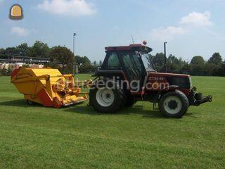 Tractor met grasveegmachi... Omgeving Purmerend