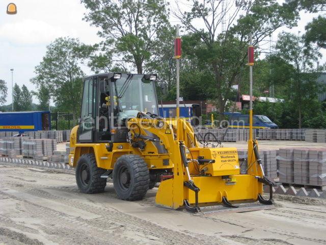 Ahlmann AZ45 met leveler