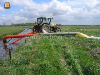 New Holland met WATER POM... Omgeving Breda