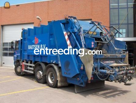 Bedrijfsafval en vuilniswagen