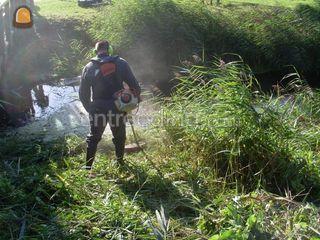 Man met bosmaaier Omgeving Oosterwolde