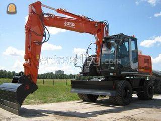 Hitachi ZX 140W-3 met tri... Omgeving Purmerend