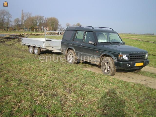 Land- rover met aanhanger