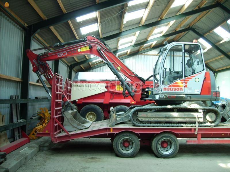 Neuson 8002 trilblok overdruk