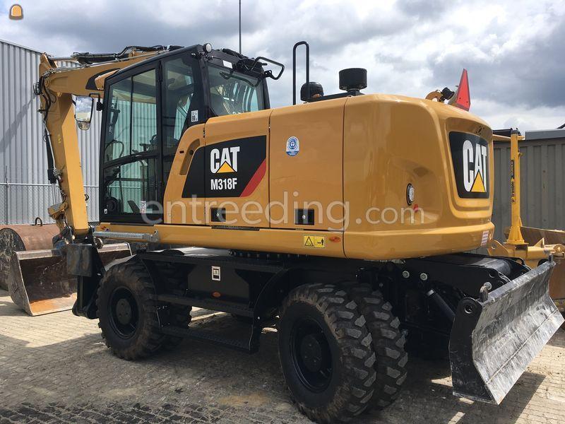 Caterpillar M 318 F stempels en blad