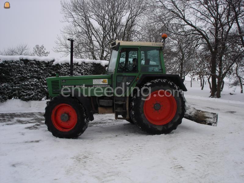 Fendt 311 met sneeuwschuif