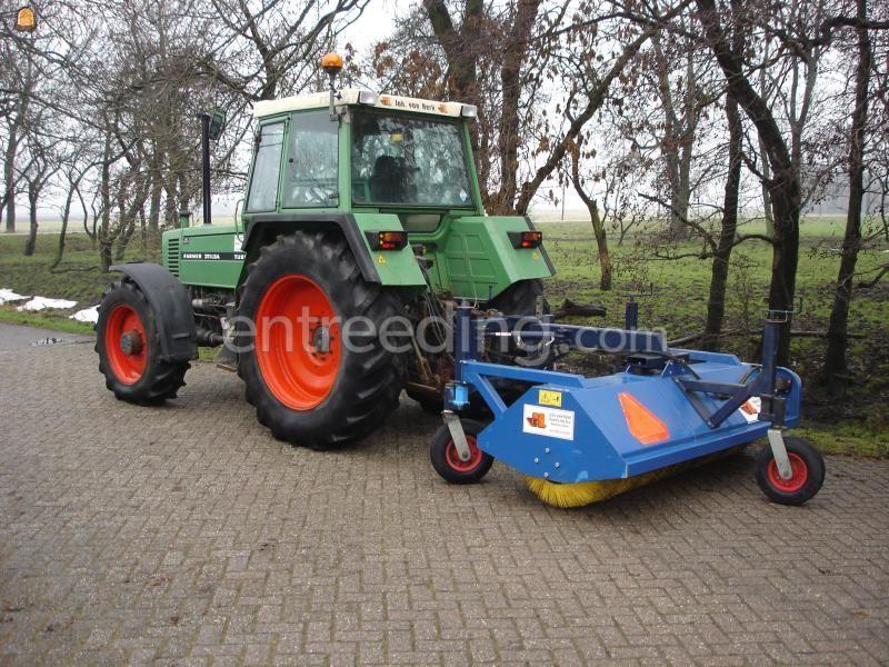 Fendt 311 met AP veegmachine