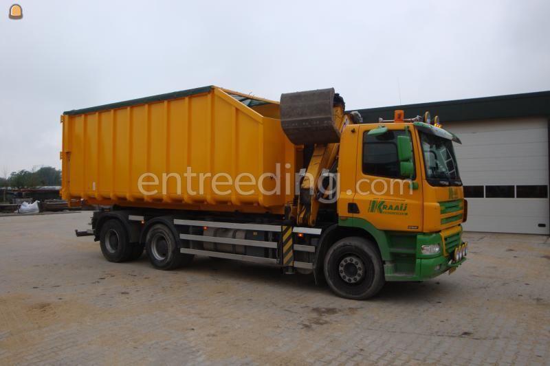 Container met hydraulische klapnetten