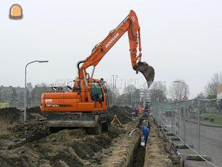 Doosan DX 140W Omgeving Lisse