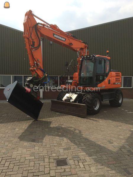Doosan DX 140W + Draai/Kantelstuk